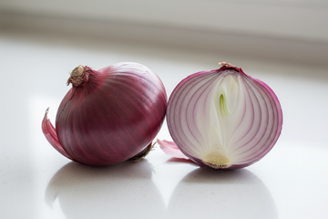 couple medium sized red onions with one cut in half